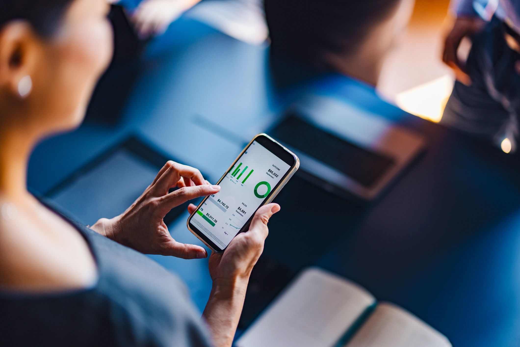 SmartProTrade team collaborating on trading education materials